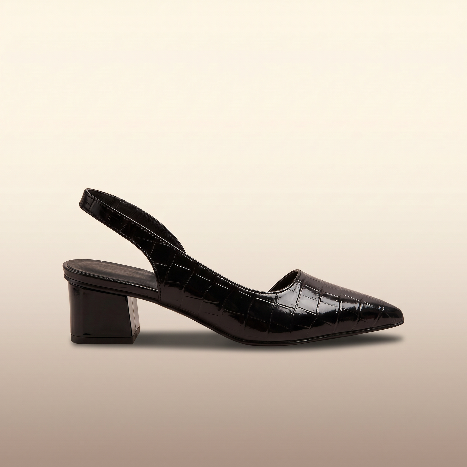 Side profile of Solène black slingback heels showing the block heel